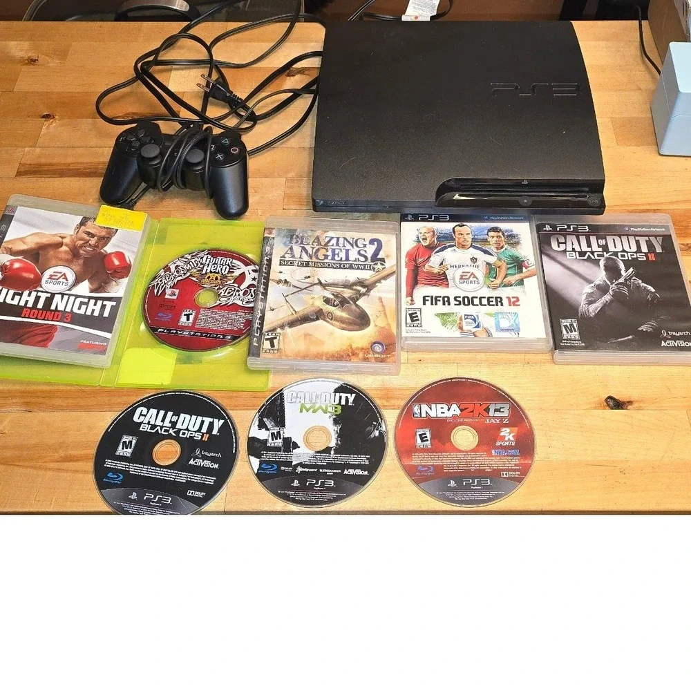 Sony PlayStation 3 PS3 Slim CECH-3001B Bundle 320GB Black 8 Games Controller